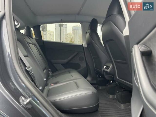 Серый Тесла Model Y, объемом двигателя 0 л и пробегом 22 тыс. км за 34700 $, фото 35 на Automoto.ua