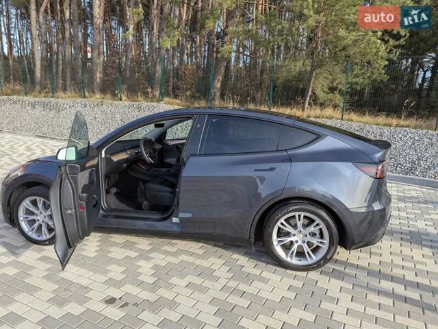 Серый Тесла Model Y, объемом двигателя 0 л и пробегом 29 тыс. км за 30500 $, фото 11 на Automoto.ua