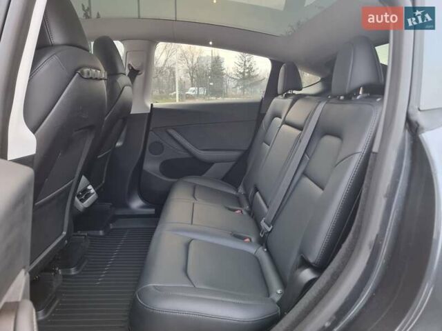 Серый Тесла Model Y, объемом двигателя 0 л и пробегом 24 тыс. км за 30900 $, фото 13 на Automoto.ua