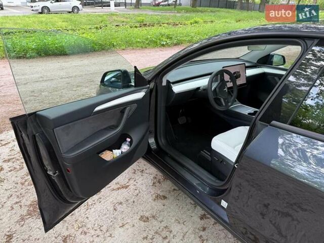 Серый Тесла Model Y, объемом двигателя 0 л и пробегом 9 тыс. км за 29990 $, фото 24 на Automoto.ua
