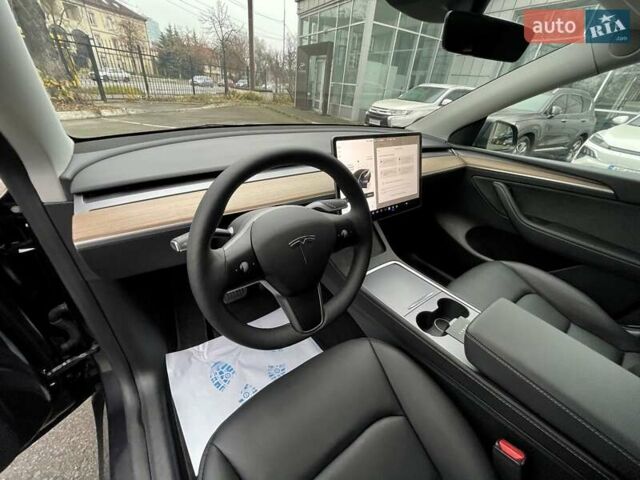 Серый Тесла Model Y, объемом двигателя 0 л и пробегом 23 тыс. км за 28800 $, фото 15 на Automoto.ua