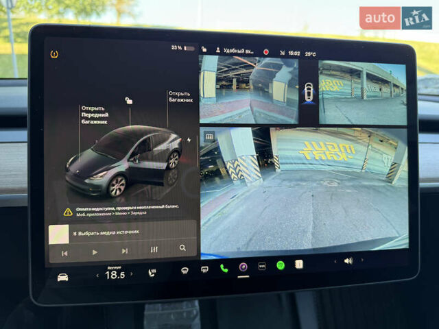 Серый Тесла Model Y, объемом двигателя 0 л и пробегом 23 тыс. км за 29800 $, фото 18 на Automoto.ua