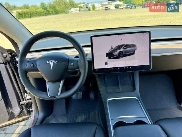 Серый Тесла Model Y, объемом двигателя 0 л и пробегом 45 тыс. км за 24500 $, фото 29 на Automoto.ua