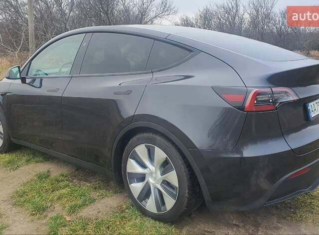 Серый Тесла Model Y, объемом двигателя 0 л и пробегом 25 тыс. км за 28000 $, фото 4 на Automoto.ua