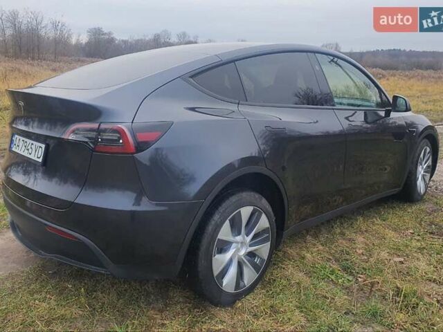 Серый Тесла Model Y, объемом двигателя 0 л и пробегом 25 тыс. км за 28000 $, фото 2 на Automoto.ua