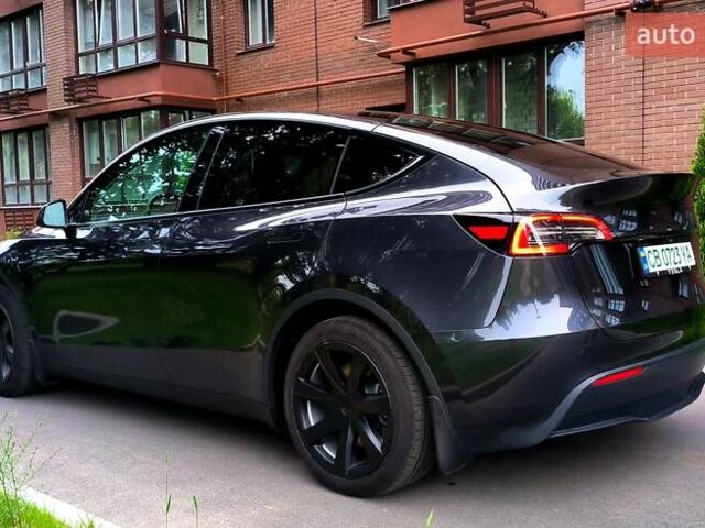 Серый Тесла Model Y, объемом двигателя 0 л и пробегом 15 тыс. км за 34500 $, фото 1 на Automoto.ua