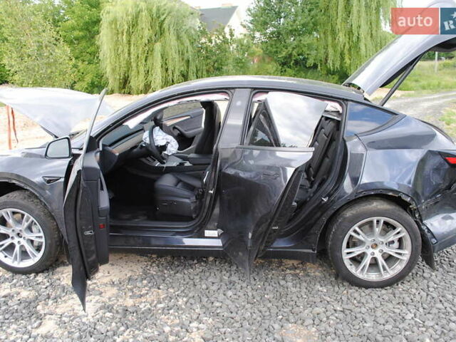 Серый Тесла Model Y, объемом двигателя 0 л и пробегом 21 тыс. км за 18900 $, фото 16 на Automoto.ua