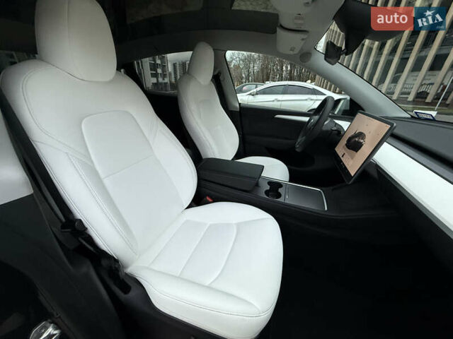 Серый Тесла Model Y, объемом двигателя 0 л и пробегом 5 тыс. км за 29490 $, фото 11 на Automoto.ua