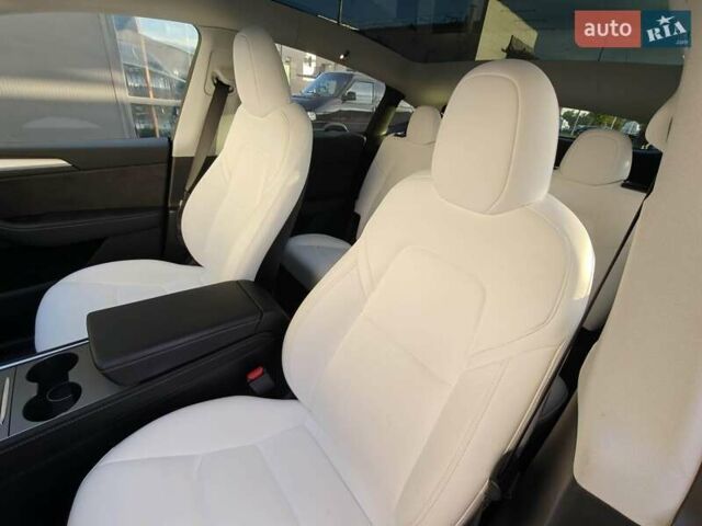 Серый Тесла Model Y, объемом двигателя 0 л и пробегом 21 тыс. км за 34000 $, фото 10 на Automoto.ua