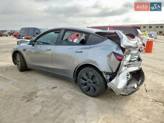 Серый Тесла Model Y, объемом двигателя 0 л и пробегом 26 тыс. км за 21800 $, фото 2 на Automoto.ua