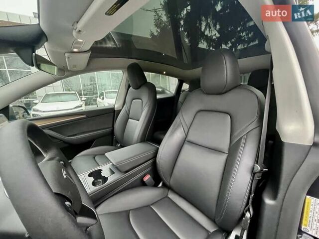 Серый Тесла Model Y, объемом двигателя 0 л и пробегом 23 тыс. км за 28800 $, фото 16 на Automoto.ua