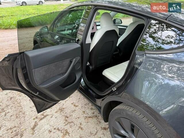 Серый Тесла Model Y, объемом двигателя 0 л и пробегом 9 тыс. км за 29990 $, фото 26 на Automoto.ua