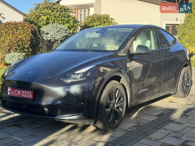 Серый Тесла Model Y, объемом двигателя 0 л и пробегом 8 тыс. км за 28700 $, фото 1 на Automoto.ua