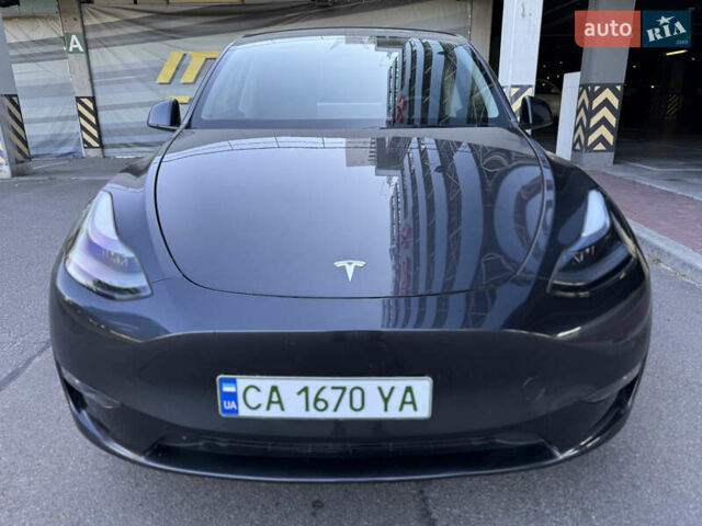 Серый Тесла Model Y, объемом двигателя 0 л и пробегом 23 тыс. км за 29800 $, фото 3 на Automoto.ua