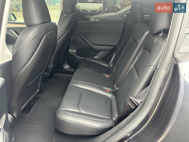 Серый Тесла Model Y, объемом двигателя 0 л и пробегом 22 тыс. км за 31500 $, фото 16 на Automoto.ua