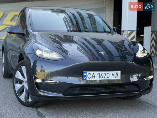Серый Тесла Model Y, объемом двигателя 0 л и пробегом 23 тыс. км за 29800 $, фото 4 на Automoto.ua