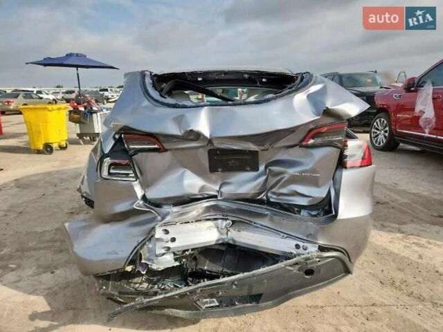 Серый Тесла Model Y, объемом двигателя 0 л и пробегом 26 тыс. км за 21800 $, фото 5 на Automoto.ua