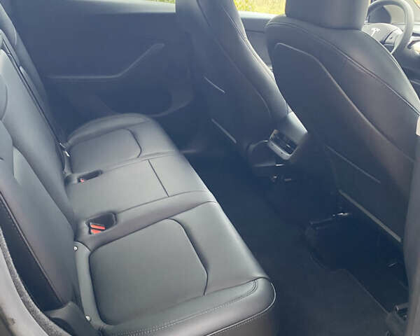 Серый Тесла Model Y, объемом двигателя 0 л и пробегом 12 тыс. км за 30800 $, фото 9 на Automoto.ua