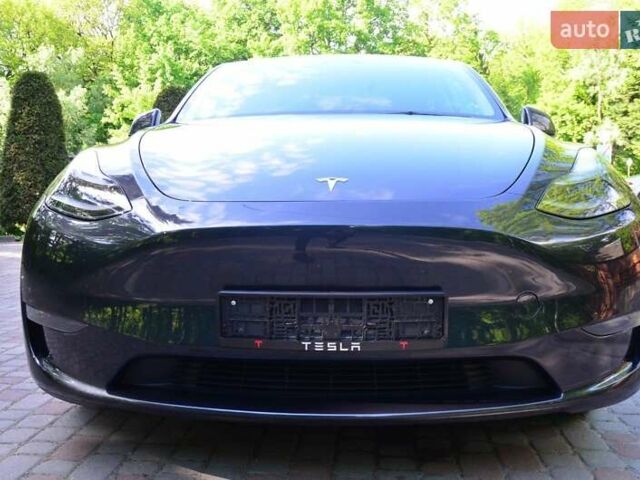 Сірий Тесла Model Y, об'ємом двигуна 0 л та пробігом 52 тис. км за 34200 $, фото 17 на Automoto.ua