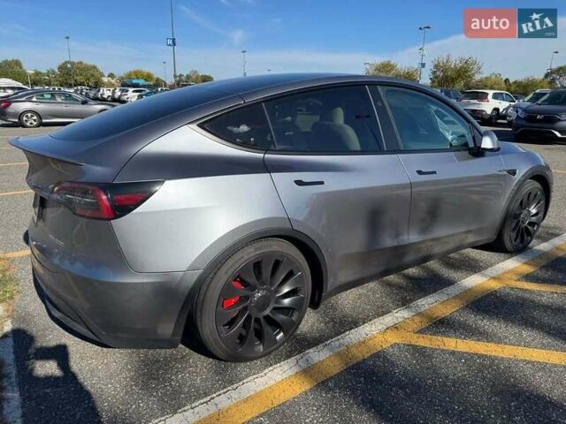 Серый Тесла Model Y, объемом двигателя 0 л и пробегом 15 тыс. км за 28500 $, фото 1 на Automoto.ua