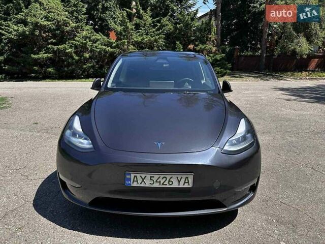 Серый Тесла Model Y, объемом двигателя 0 л и пробегом 19 тыс. км за 32500 $, фото 1 на Automoto.ua