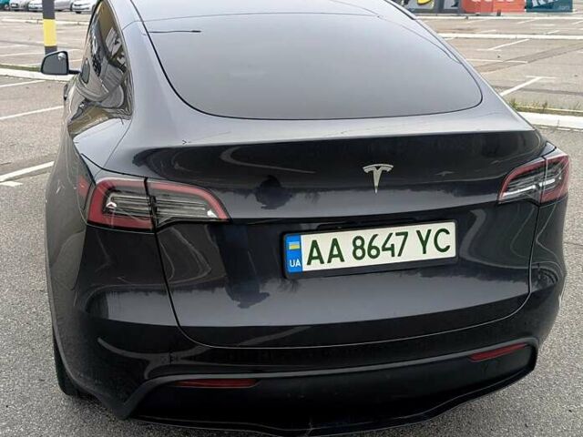 Серый Тесла Model Y, объемом двигателя 0 л и пробегом 13 тыс. км за 29900 $, фото 3 на Automoto.ua