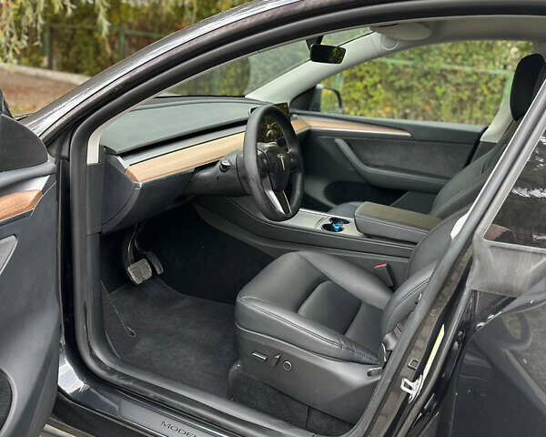 Серый Тесла Model Y, объемом двигателя 0 л и пробегом 26 тыс. км за 31700 $, фото 14 на Automoto.ua