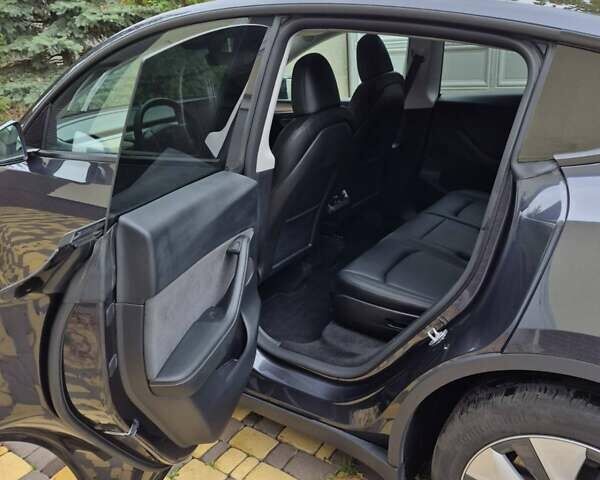 Серый Тесла Model Y, объемом двигателя 0 л и пробегом 18 тыс. км за 30500 $, фото 15 на Automoto.ua