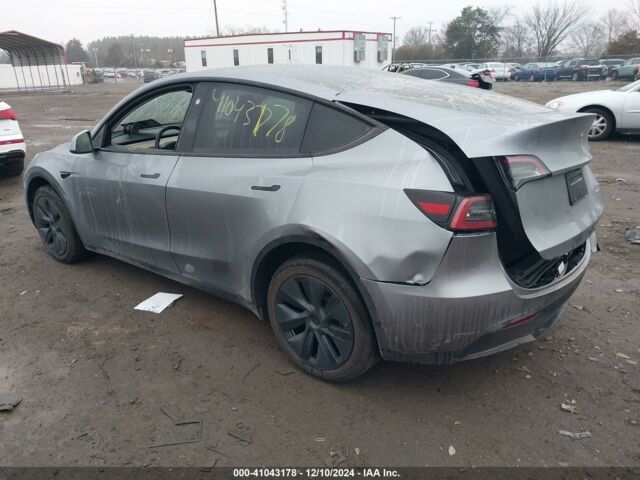 Серый Тесла Model Y, объемом двигателя 0 л и пробегом 6 тыс. км за 25500 $, фото 3 на Automoto.ua