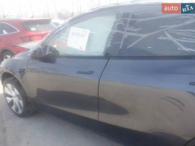 Серый Тесла Model Y, объемом двигателя 0 л и пробегом 22 тыс. км за 12900 $, фото 1 на Automoto.ua