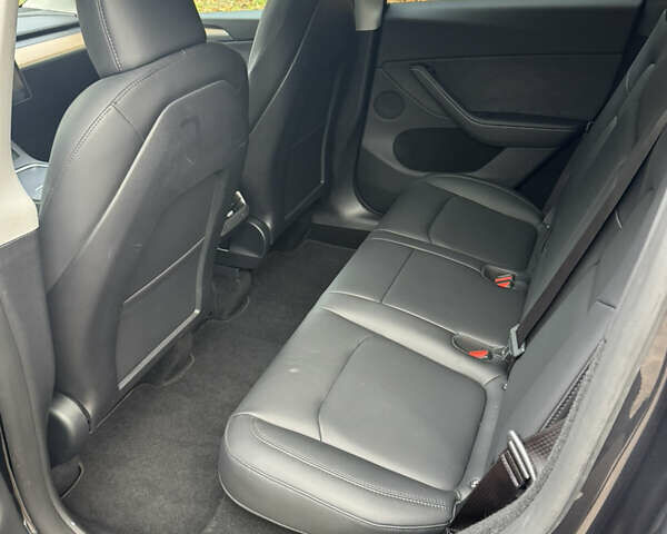 Серый Тесла Model Y, объемом двигателя 0 л и пробегом 15 тыс. км за 34500 $, фото 8 на Automoto.ua