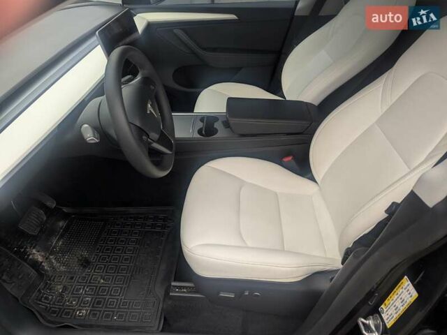 Серый Тесла Model Y, объемом двигателя 0 л и пробегом 13 тыс. км за 29900 $, фото 4 на Automoto.ua
