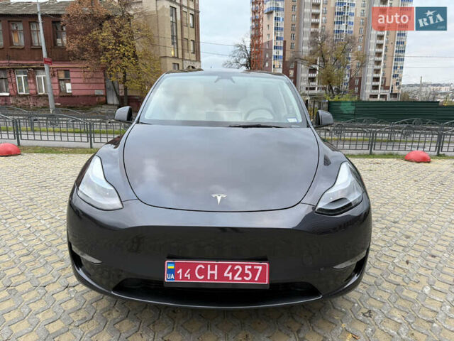 Серый Тесла Model Y, объемом двигателя 0 л и пробегом 5 тыс. км за 29490 $, фото 1 на Automoto.ua