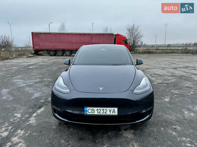 Серый Тесла Model Y, объемом двигателя 0 л и пробегом 22 тыс. км за 27000 $, фото 1 на Automoto.ua
