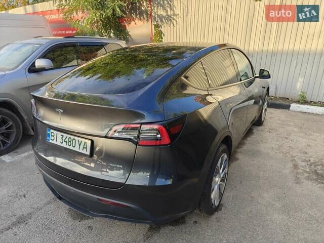 Серый Тесла Model Y, объемом двигателя 0 л и пробегом 21 тыс. км за 34000 $, фото 3 на Automoto.ua