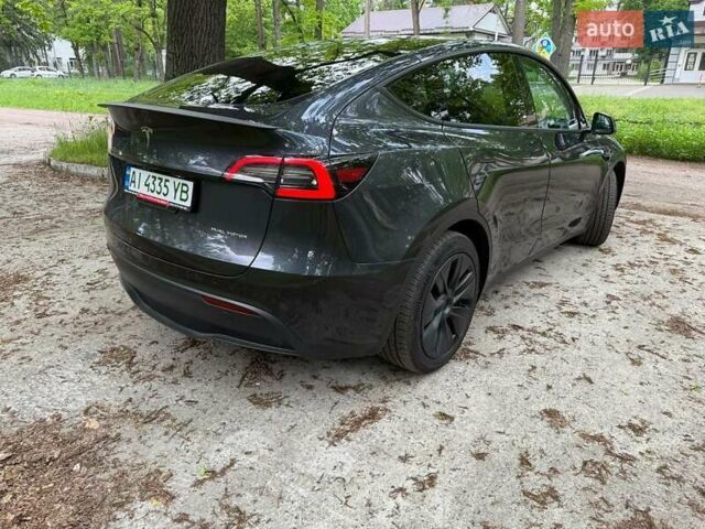 Серый Тесла Model Y, объемом двигателя 0 л и пробегом 9 тыс. км за 29990 $, фото 4 на Automoto.ua