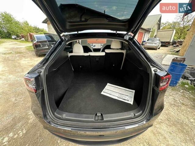 Серый Тесла Model Y, объемом двигателя 0 л и пробегом 12 тыс. км за 28400 $, фото 6 на Automoto.ua