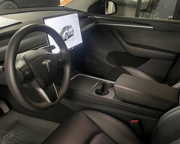 Серый Тесла Model Y, объемом двигателя 0 л и пробегом 15 тыс. км за 31999 $, фото 9 на Automoto.ua