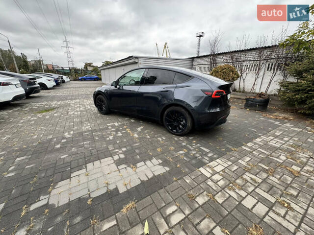 Серый Тесла Model Y, объемом двигателя 0 л и пробегом 8 тыс. км за 31999 $, фото 6 на Automoto.ua