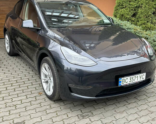 Серый Тесла Model Y, объемом двигателя 0 л и пробегом 15 тыс. км за 34500 $, фото 1 на Automoto.ua