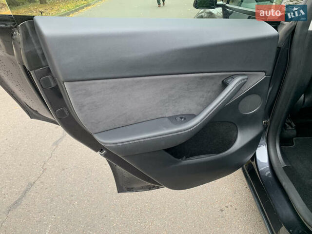 Серый Тесла Model Y, объемом двигателя 0 л и пробегом 14 тыс. км за 32300 $, фото 23 на Automoto.ua