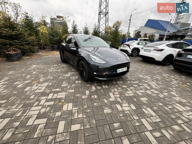 Серый Тесла Model Y, объемом двигателя 0 л и пробегом 8 тыс. км за 31999 $, фото 3 на Automoto.ua
