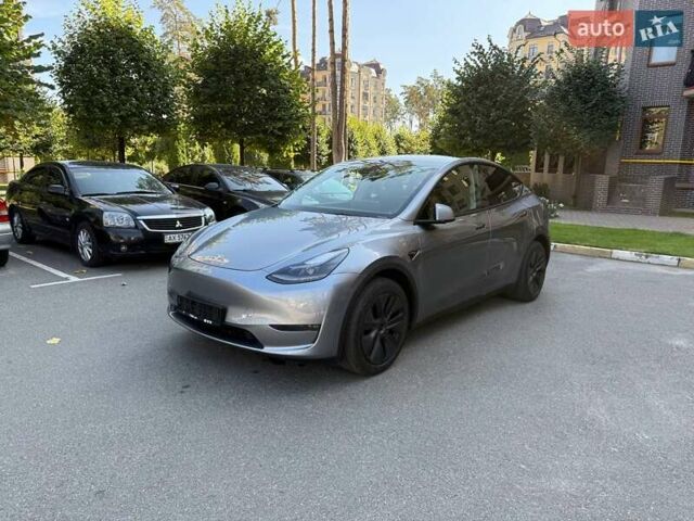 Серый Тесла Model Y, объемом двигателя 0 л и пробегом 15 тыс. км за 34999 $, фото 1 на Automoto.ua