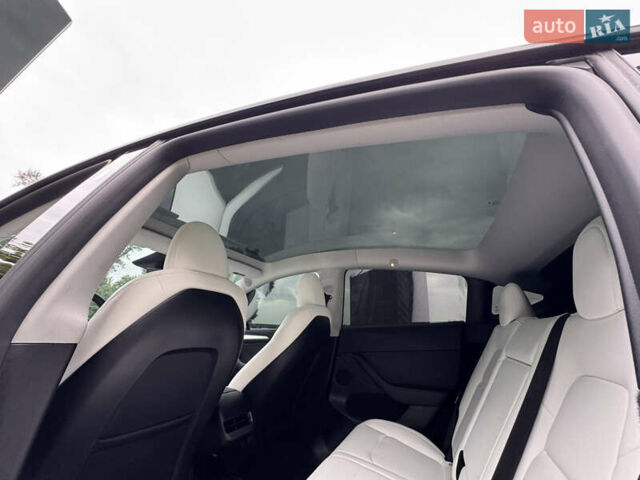 Серый Тесла Model Y, объемом двигателя 0 л и пробегом 7 тыс. км за 33999 $, фото 8 на Automoto.ua