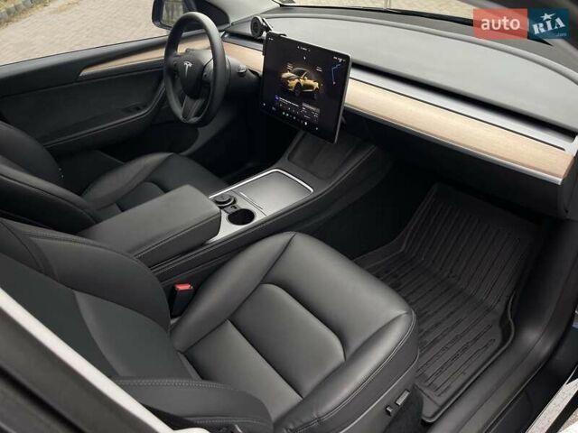 Серый Тесла Model Y, объемом двигателя 0 л и пробегом 22 тыс. км за 34700 $, фото 32 на Automoto.ua