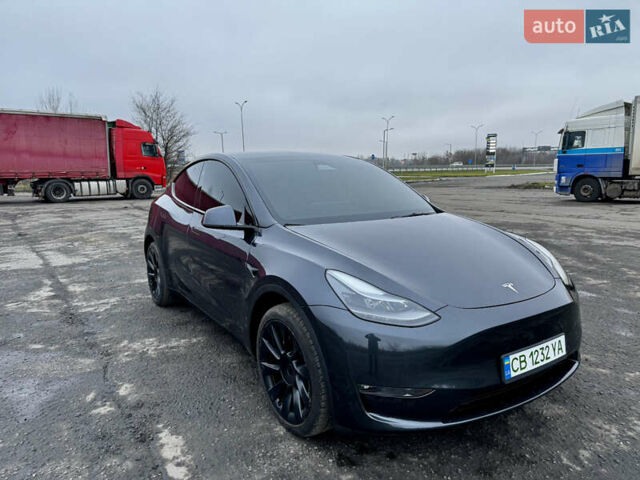 Серый Тесла Model Y, объемом двигателя 0 л и пробегом 22 тыс. км за 27000 $, фото 2 на Automoto.ua