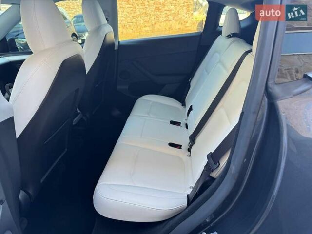 Серый Тесла Model Y, объемом двигателя 0 л и пробегом 22 тыс. км за 30900 $, фото 21 на Automoto.ua