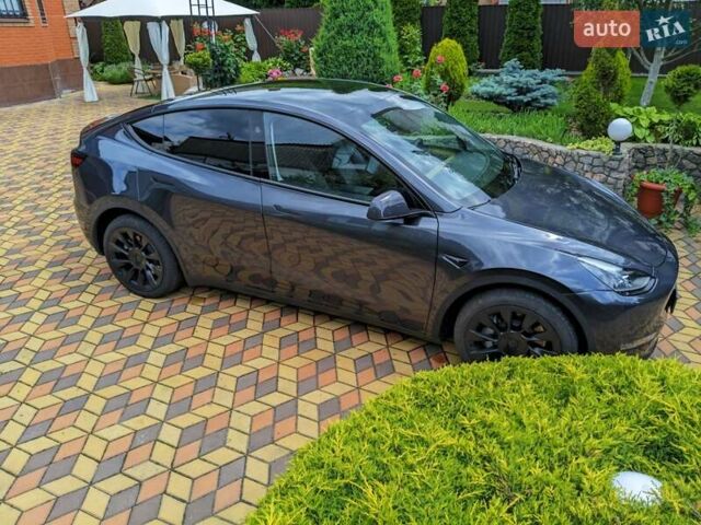 Серый Тесла Model Y, объемом двигателя 0 л и пробегом 16 тыс. км за 26200 $, фото 5 на Automoto.ua
