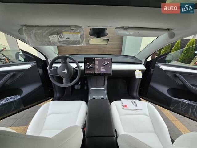 Серый Тесла Model Y, объемом двигателя 0 л и пробегом 128 тыс. км за 35700 $, фото 8 на Automoto.ua