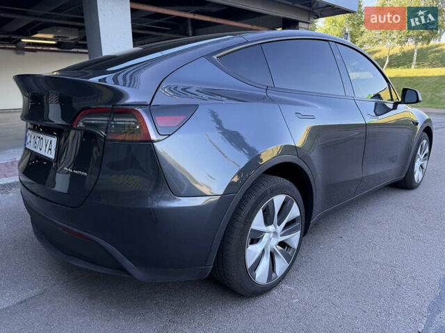 Серый Тесла Model Y, объемом двигателя 0 л и пробегом 23 тыс. км за 29800 $, фото 7 на Automoto.ua